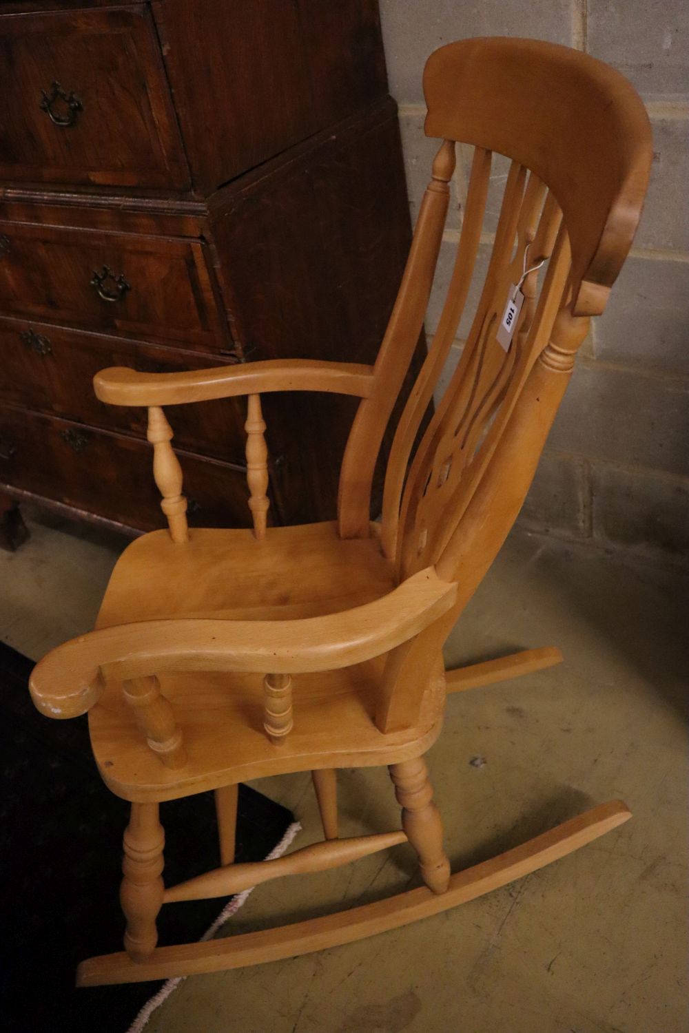 A pine and beech Windsor rocking chair